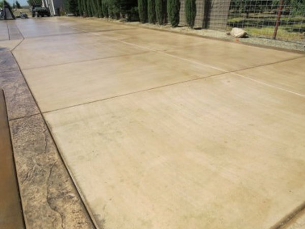 This is an image of concrete driveway contractors finished job in Tracy, California.